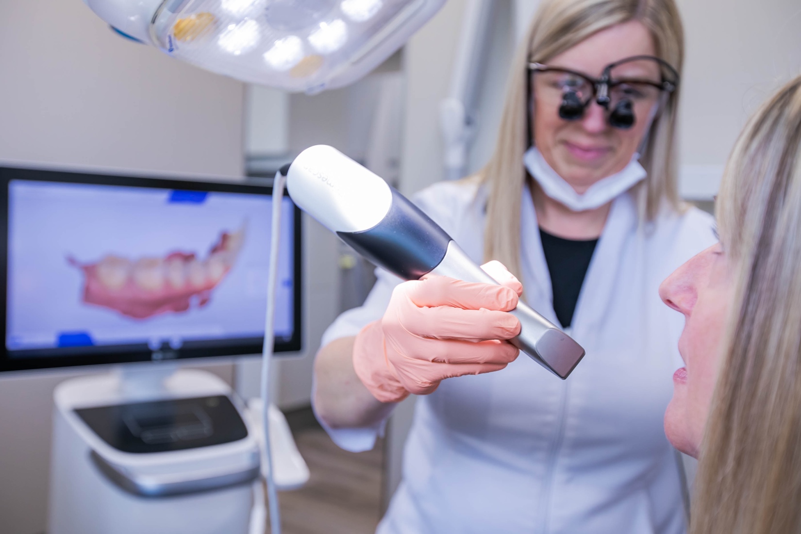 Dentist uses UV tool for dental fillings procedure at Rosemary Heights Dental in Surrey, BC
